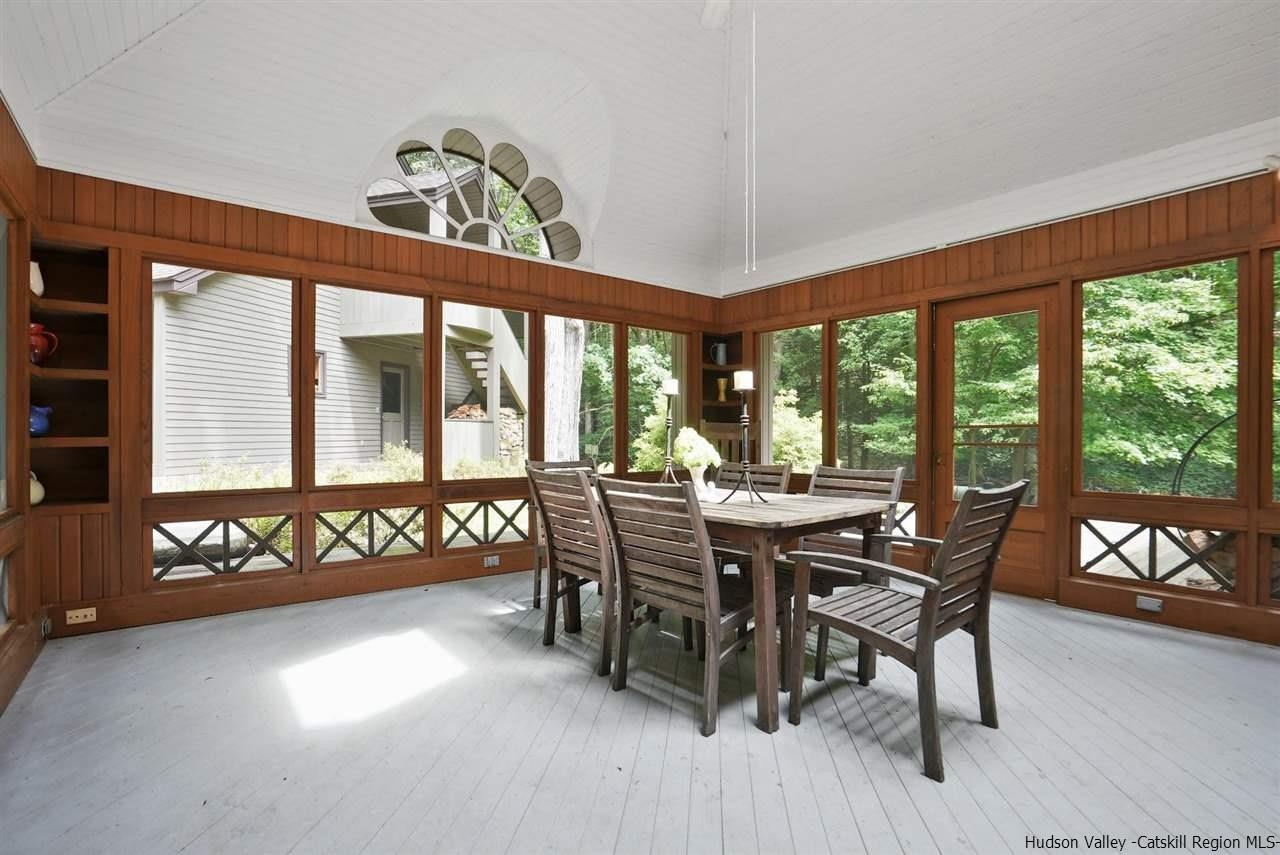 48 Rock Ridge Road New Paltz, NY 12561 - Photo 30 of 35 a view of a dining room with furniture window and outside view