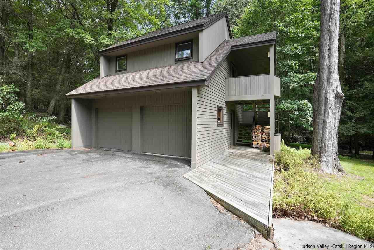 48 Rock Ridge Road New Paltz, NY 12561 - Photo 32 of 35 a front view of a house with garden