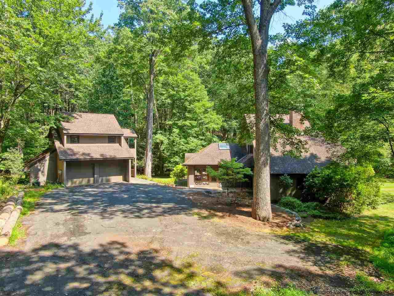 48 Rock Ridge Road New Paltz, NY 12561 - Photo 34 of 35 a house with trees in front of it