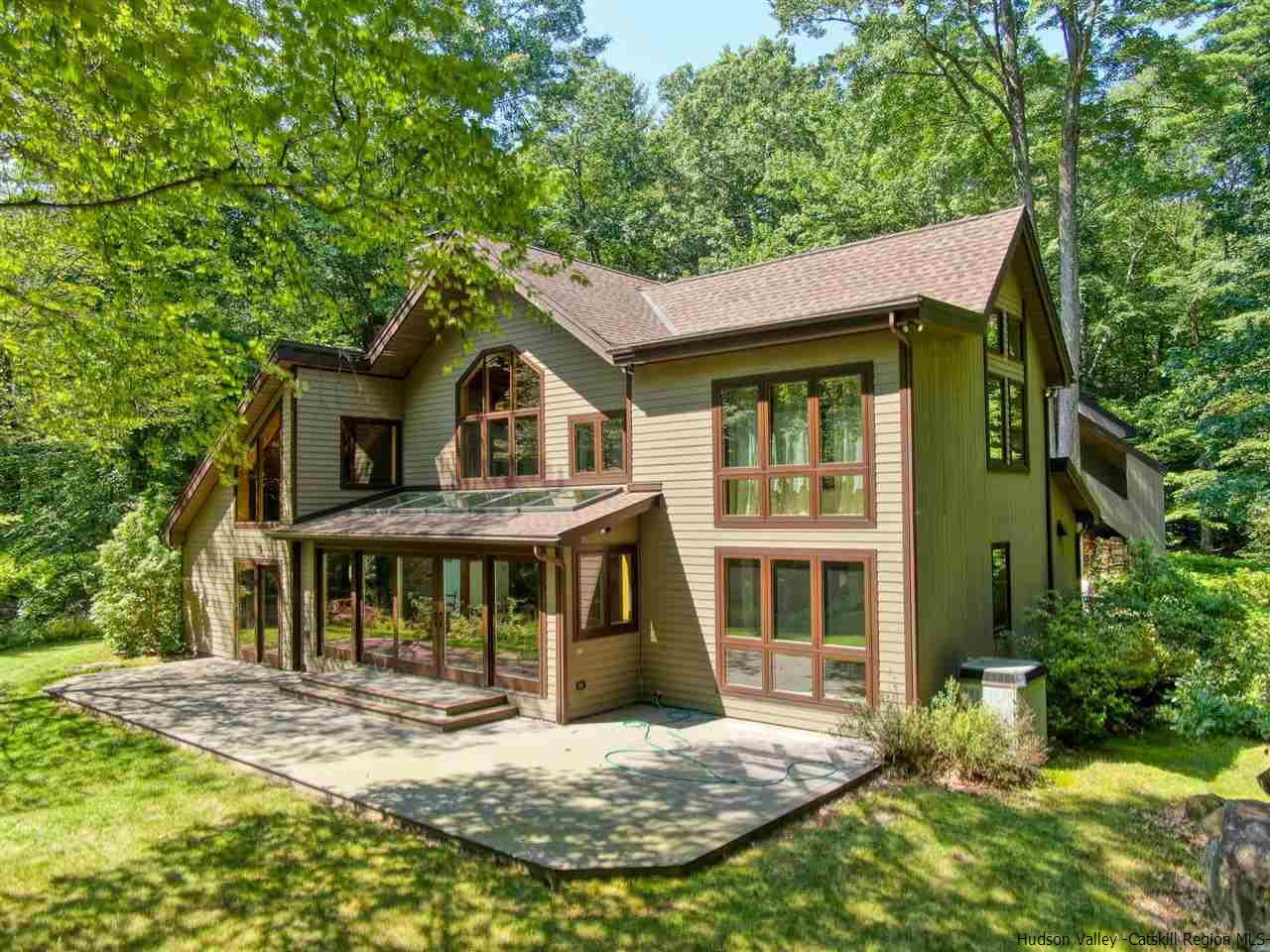 48 Rock Ridge Road New Paltz, NY 12561 - Photo 4 of 35 a view of a house with a swimming pool