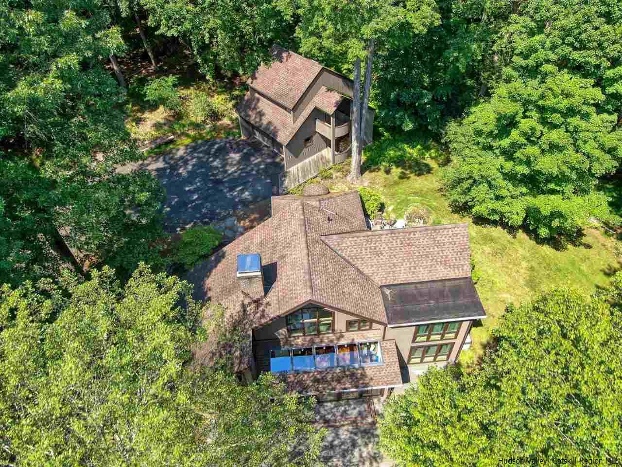 48 Rock Ridge Road New Paltz, NY 12561 - Photo 5 of 35 an aerial view of a house with a yard and large trees