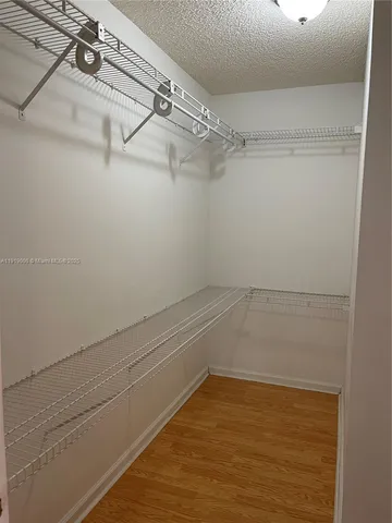 a view of a room with racks on the wall