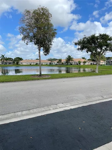 front view of a house with a big yard