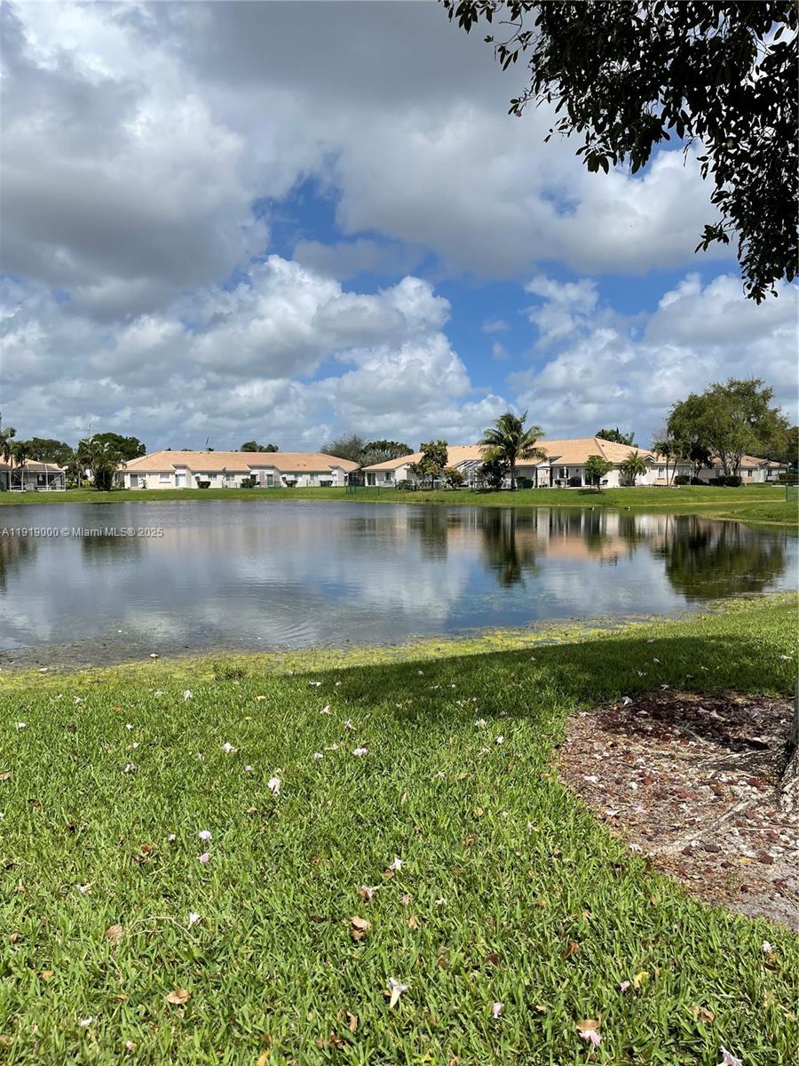 11740 Southwest 19th Street, Unit 11740 Miramar, FL 33025 - Photo 29 of 29 an aerial view of a residential houses with outdoor space and lake view