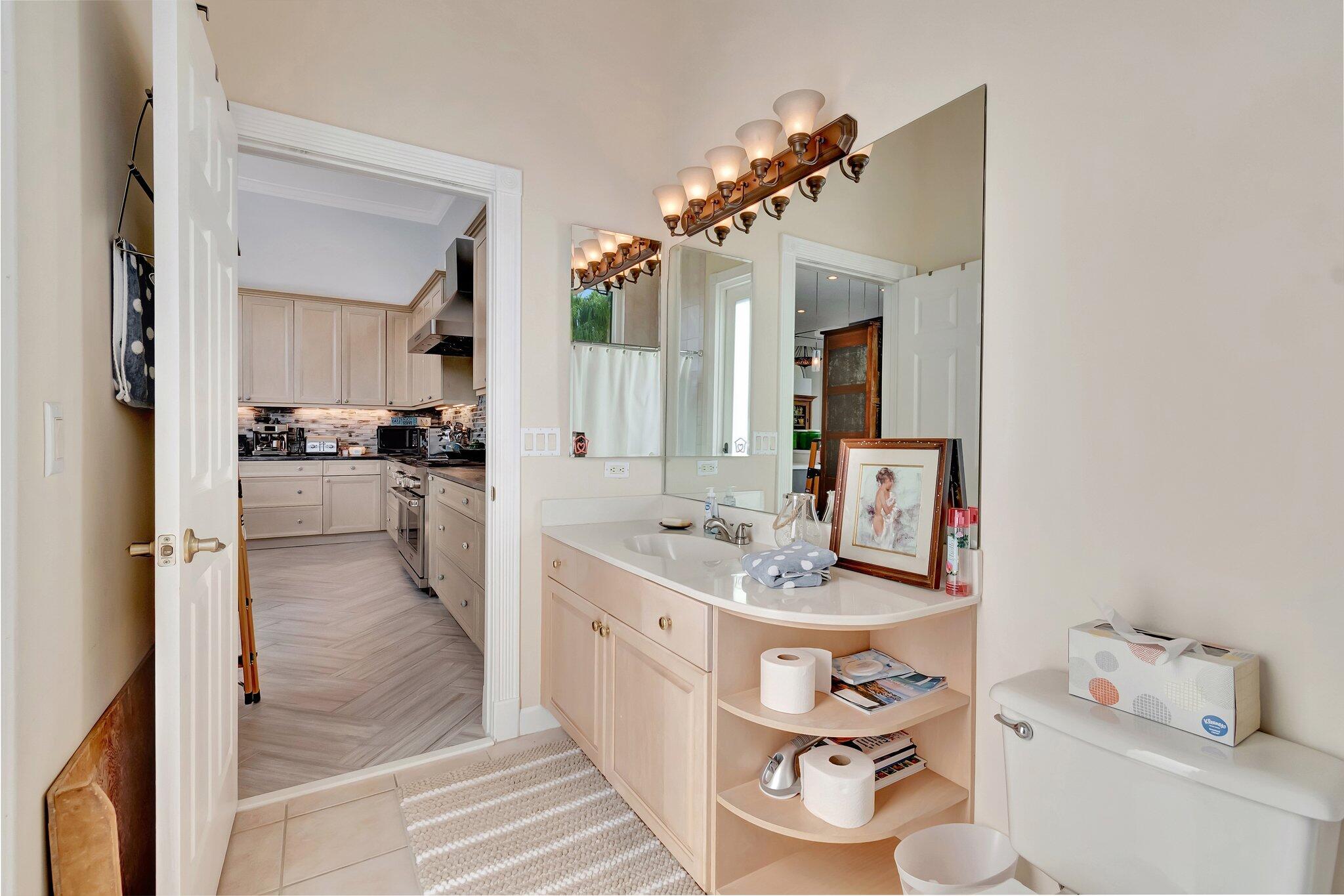 8200 Muirhead Circle Boynton Beach, FL 33472 - Photo 23 of 110 a bathroom with a sink double vanity and a mirror