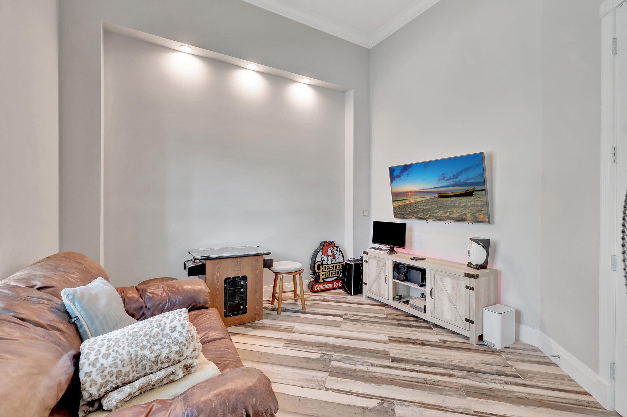 8200 Muirhead Circle Boynton Beach, FL 33472 - Photo 32 of 110 a living room with furniture and a flat screen tv