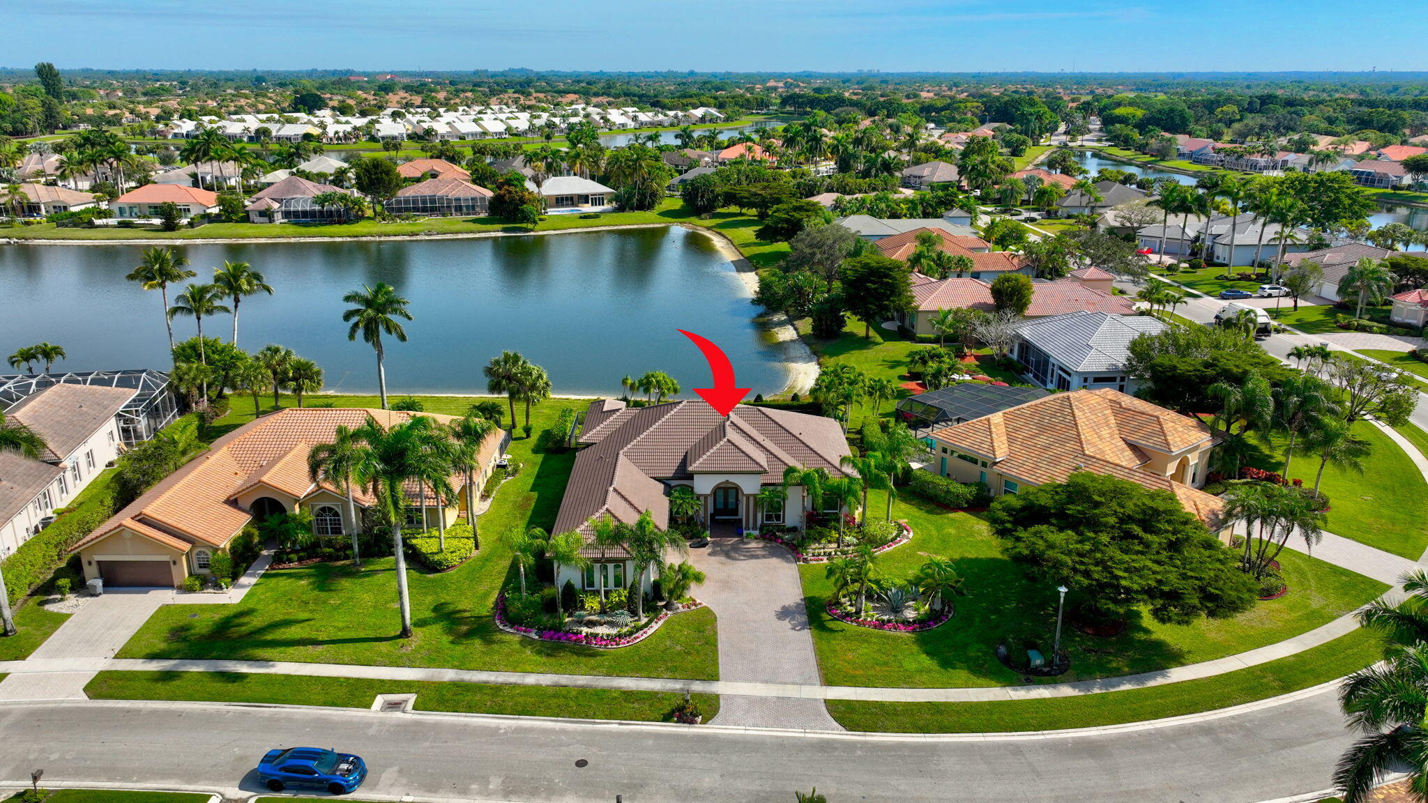 8200 Muirhead Circle Boynton Beach, FL 33472 - Photo 57 of 110 an aerial view of residential houses with outdoor space and lake view