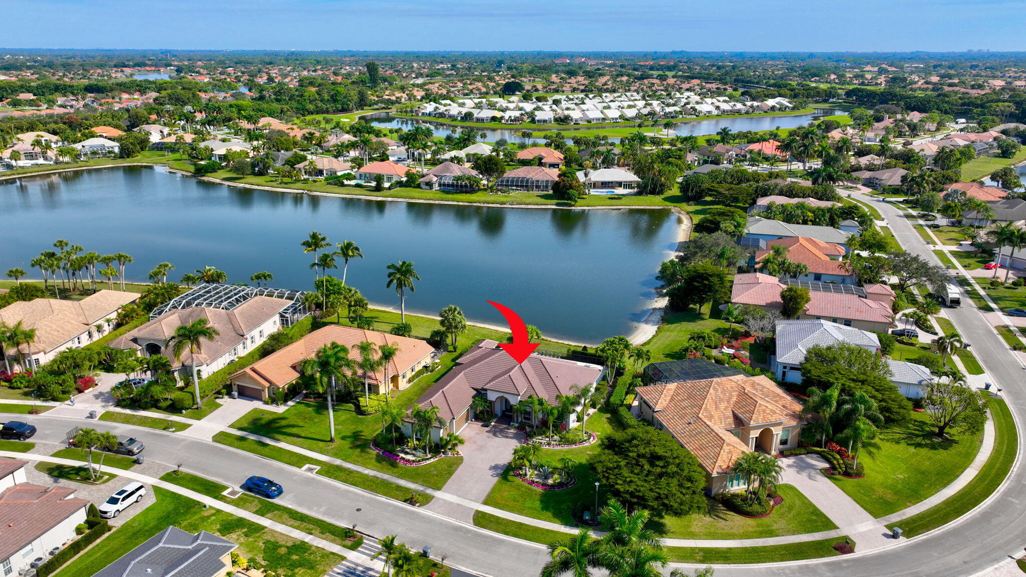 8200 Muirhead Circle Boynton Beach, FL 33472 - Photo 59 of 110 an aerial view of residential houses with outdoor space and lake view