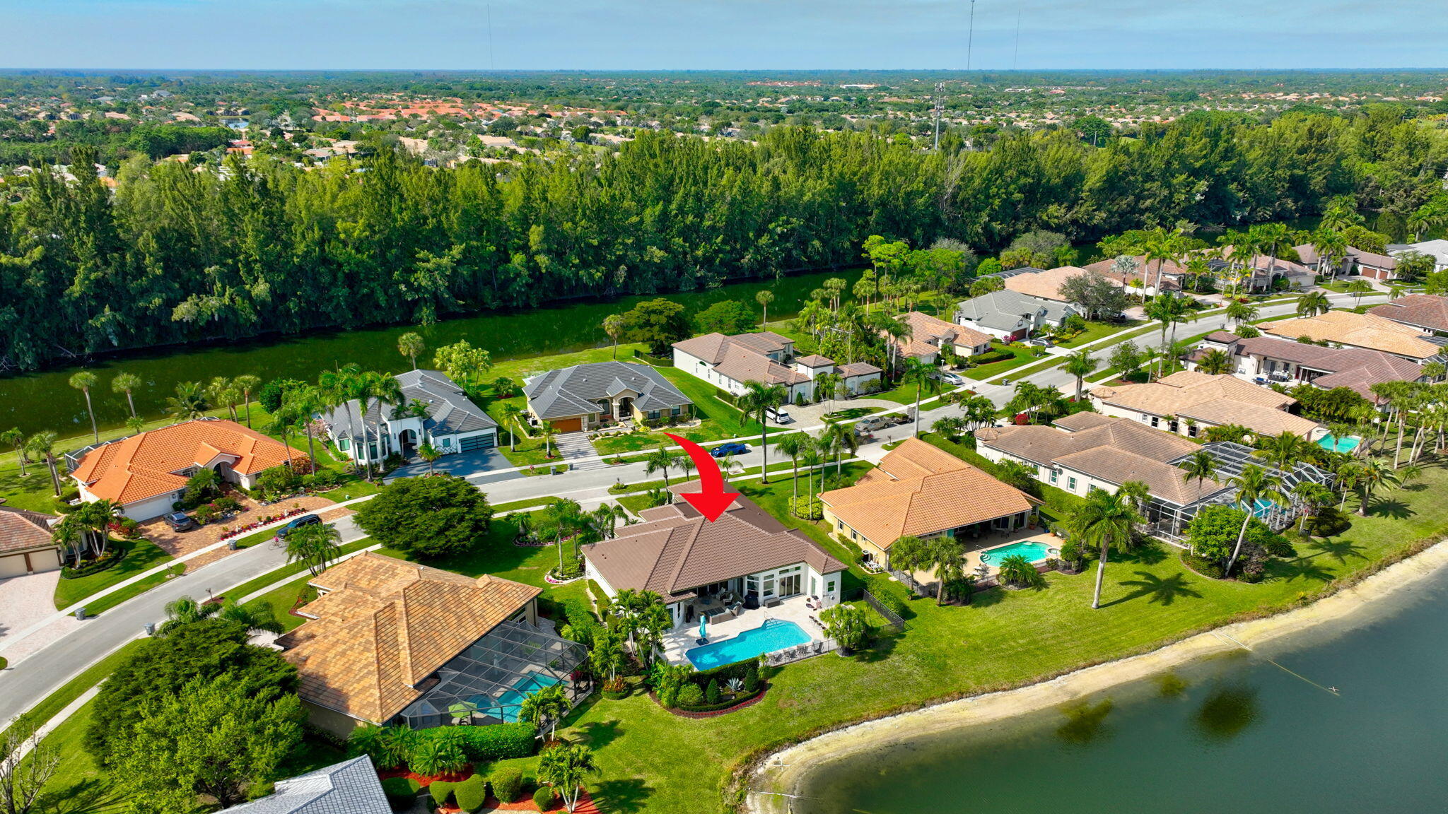 8200 Muirhead Circle Boynton Beach, FL 33472 - Photo 61 of 110 an aerial view of a houses with a garden and lake view