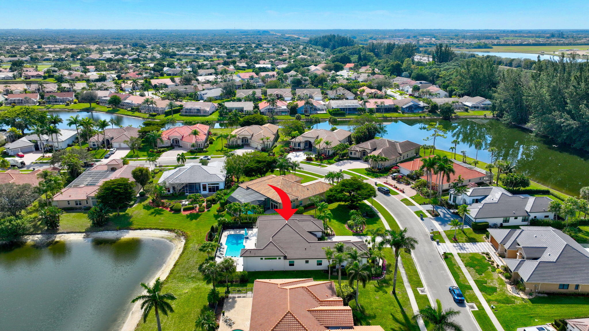 8200 Muirhead Circle Boynton Beach, FL 33472 - Photo 64 of 110 an aerial view of residential houses with outdoor space and lake view