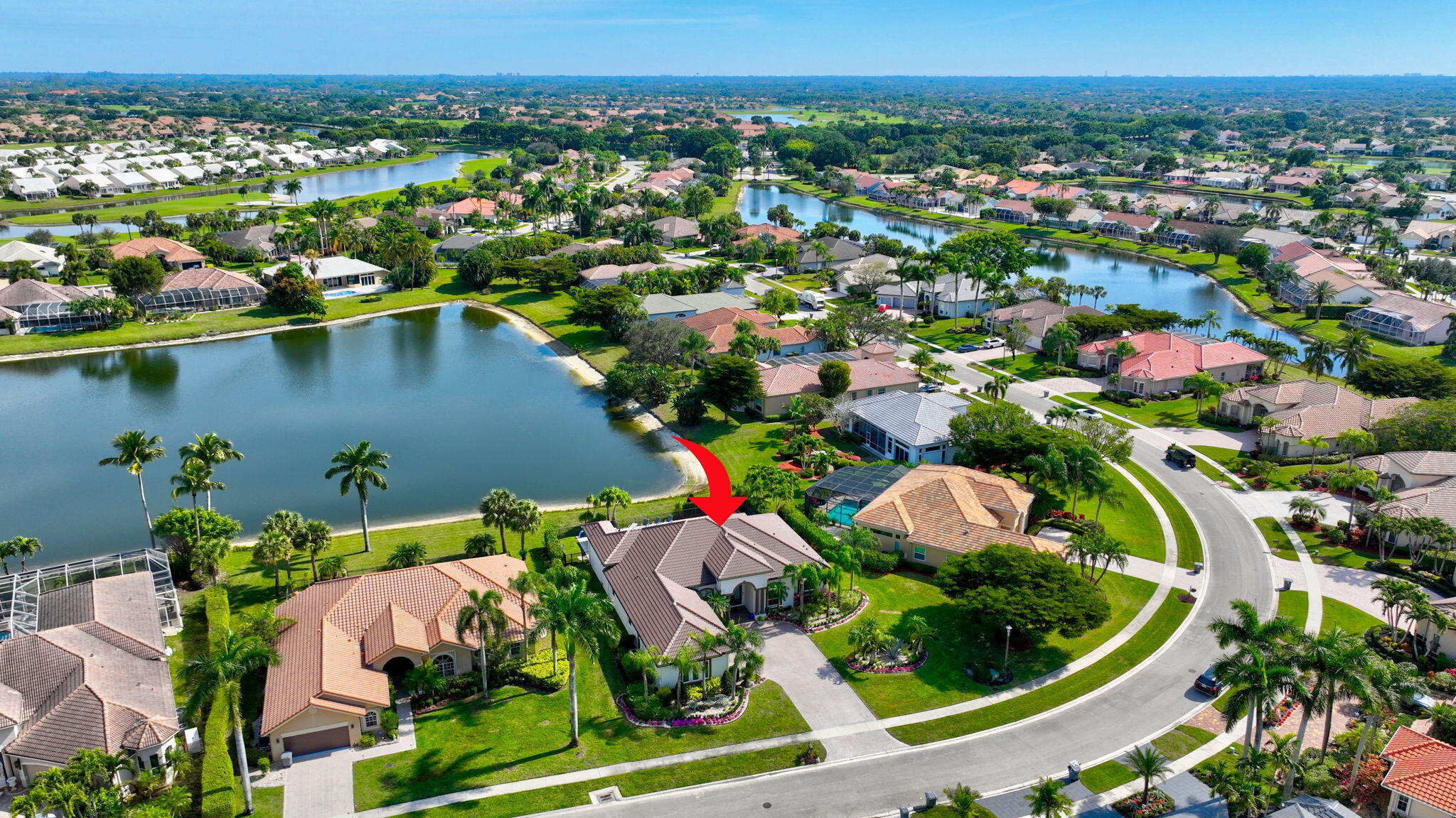 8200 Muirhead Circle Boynton Beach, FL 33472 - Photo 65 of 110 an aerial view of residential houses with outdoor space and lake view