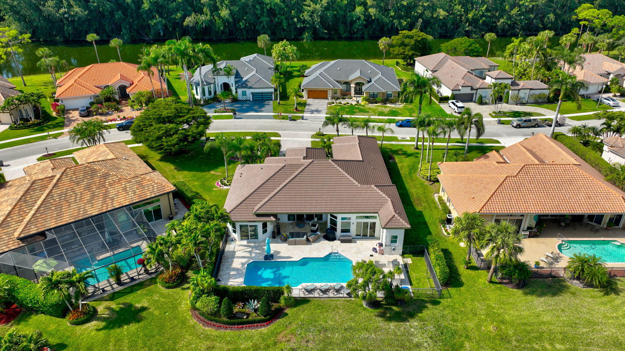 8200 Muirhead Circle Boynton Beach, FL 33472 - Photo 71 of 110 an aerial view of house with yard swimming pool and outdoor seating
