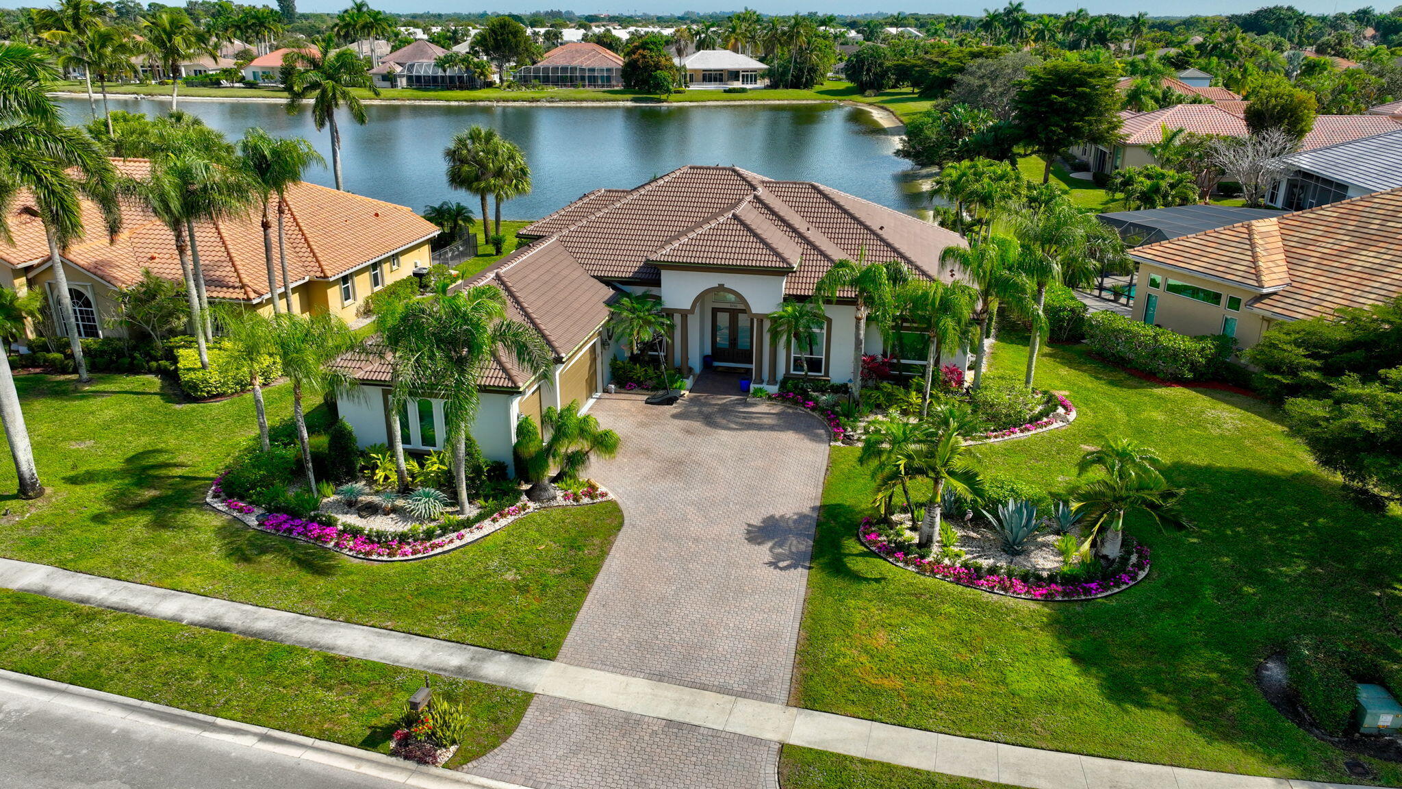 8200 Muirhead Circle Boynton Beach, FL 33472 - Photo 75 of 110 an aerial view of a house with garden space and lake view