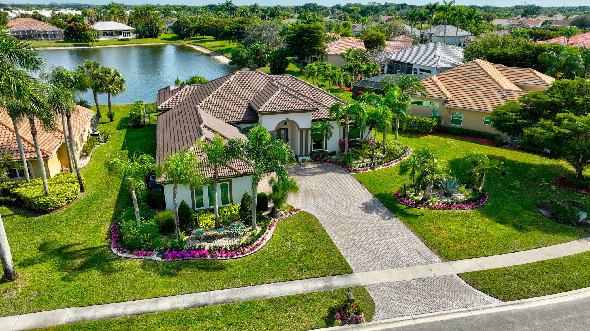 8200 Muirhead Circle Boynton Beach, FL 33472 - Photo 76 of 110 an aerial view of a house with garden space and lake view