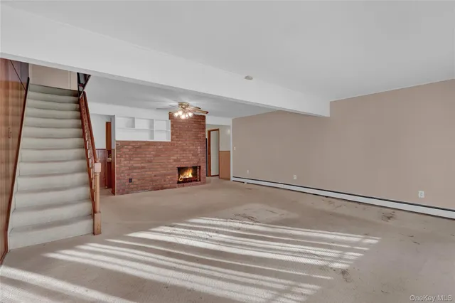 a view of a livingroom with a fireplace