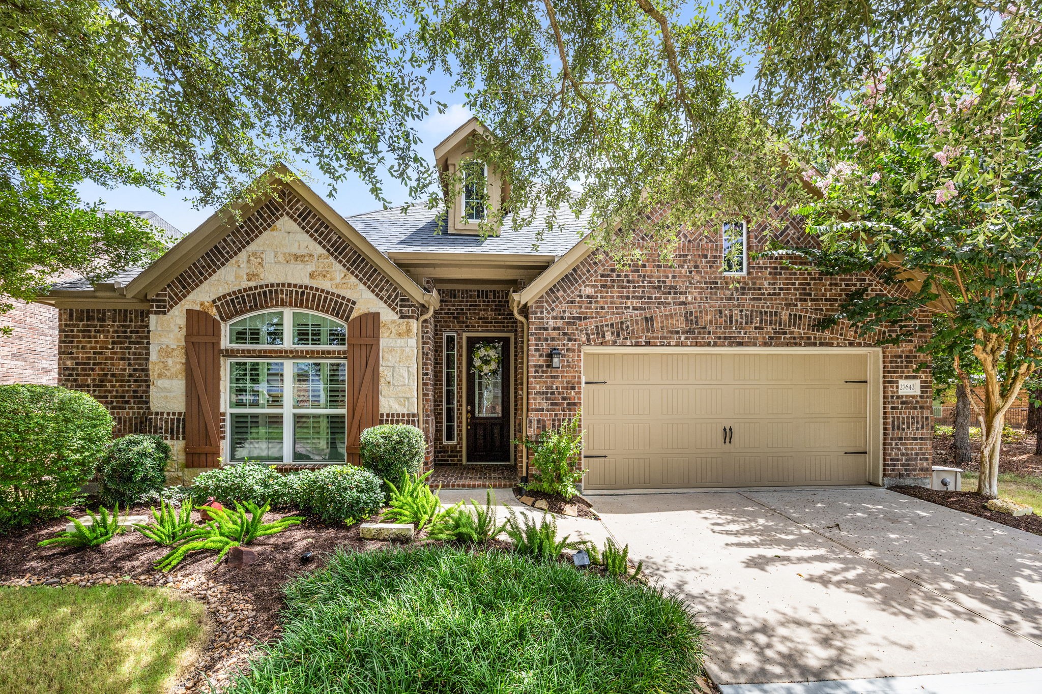 27642 Linden Ridge Lane Fulshear, TX 77441 - Photo 1 of 42 Welcome to 27642 Linden Ridge Lane, nestled in the highly sought-after master-planned community of Cross Creek Ranch. This beautiful home showcases exceptional curb appeal with its striking brick and stone elevation, charming gabled rooflines, and classic shuttered windows. Enjoy added privacy with no rear neighbors as the property backs to a serene nature reserve featuring scenic walking trails, creating a peaceful setting right in your own backyard.