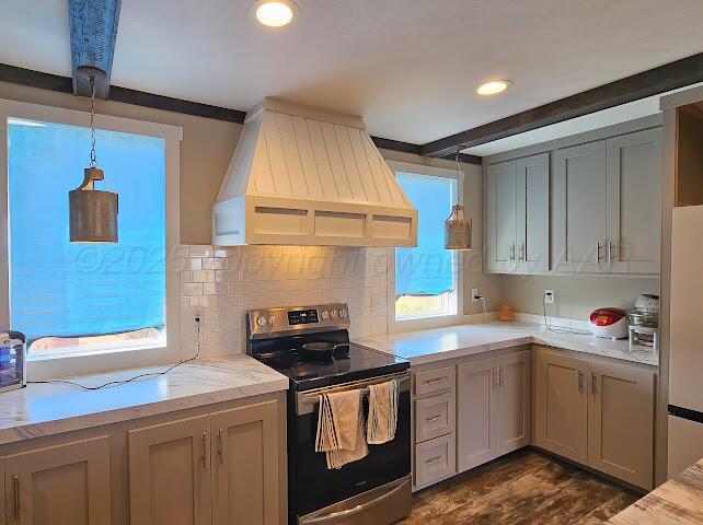 24490 RM 1061 Amarillo, TX 79124 - Photo 11 of 32 a kitchen with a sink stove and cabinets