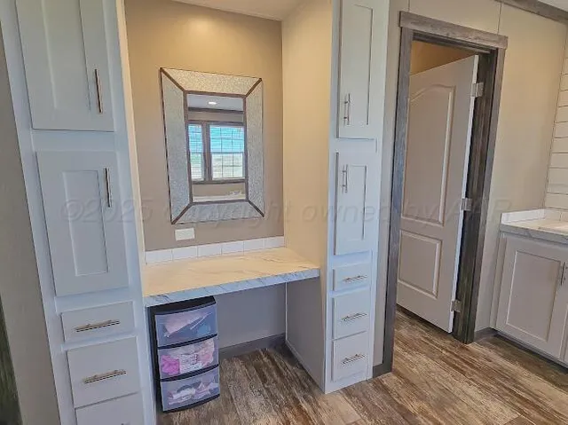 a view of hallway with closet