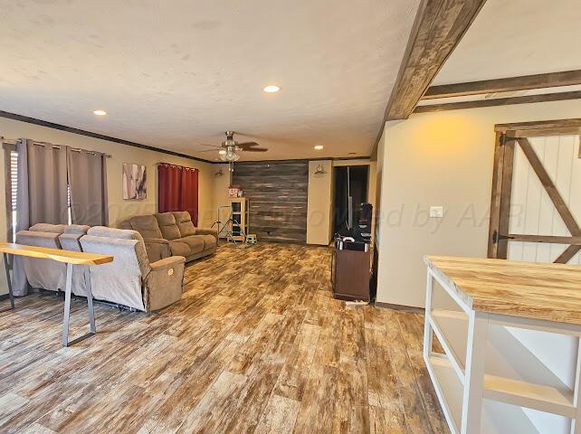 24490 RM 1061 Amarillo, TX 79124 - Photo 2 of 20 a living room with furniture and a wooden floor
