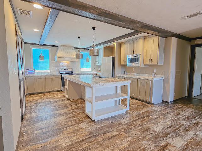 24490 RM 1061 Amarillo, TX 79124 - Photo 3 of 20 a kitchen with stainless steel appliances granite countertop a sink stove and refrigerator