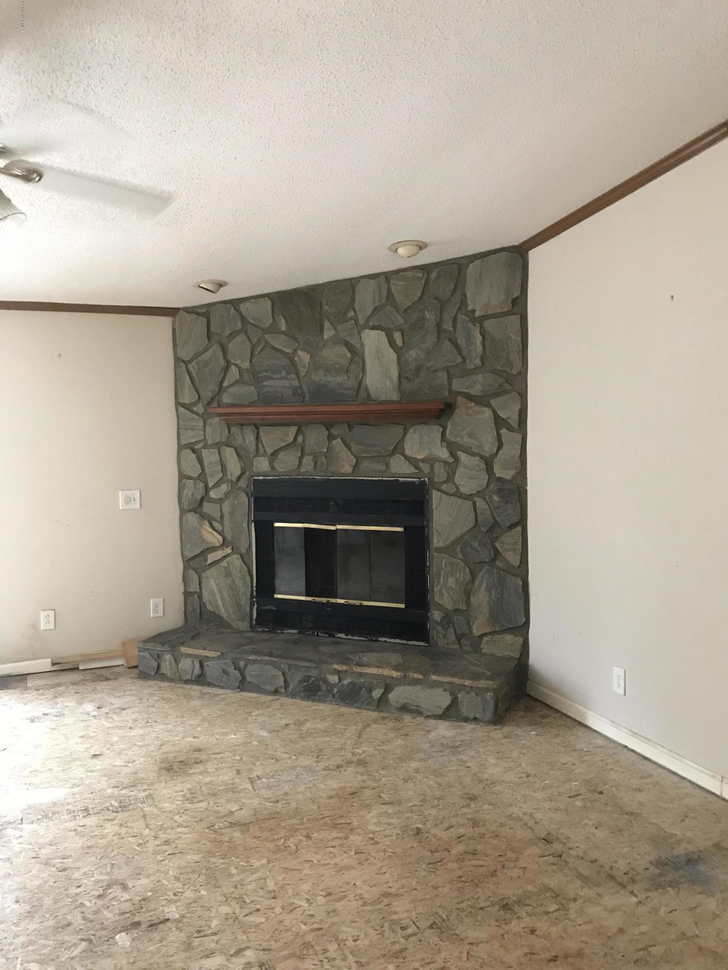 2486 Maco Road Northeast Leland, NC 28451 - Photo 29 of 43 Fireplace in Living Room