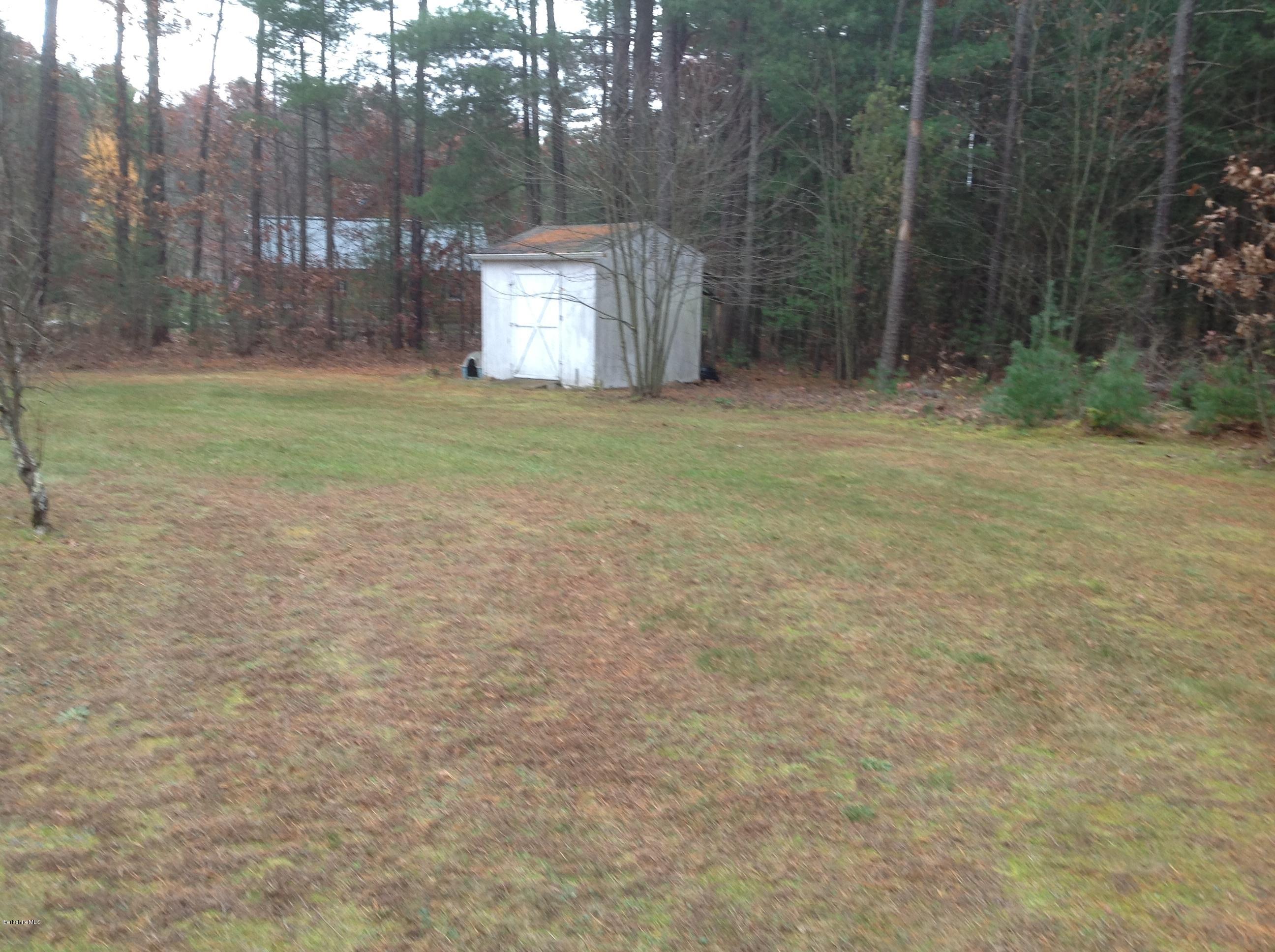 243 Bunce Road South Sheffield, MA 01222 - Photo 2 of 18 a view of a tiny house with yard and tree s