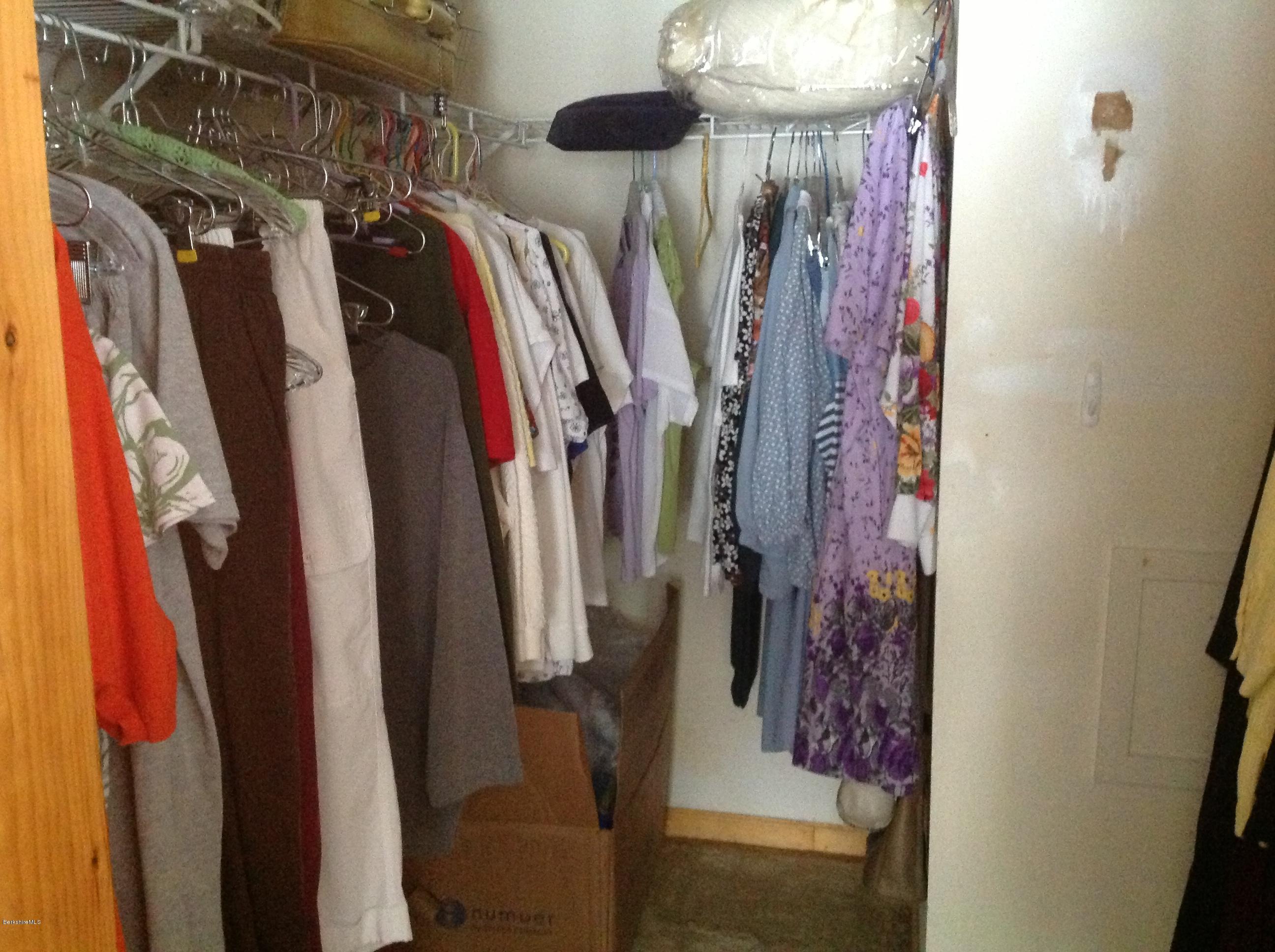 243 Bunce Road South Sheffield, MA 01222 - Photo 14 of 18 a view of walk in closet with clothes