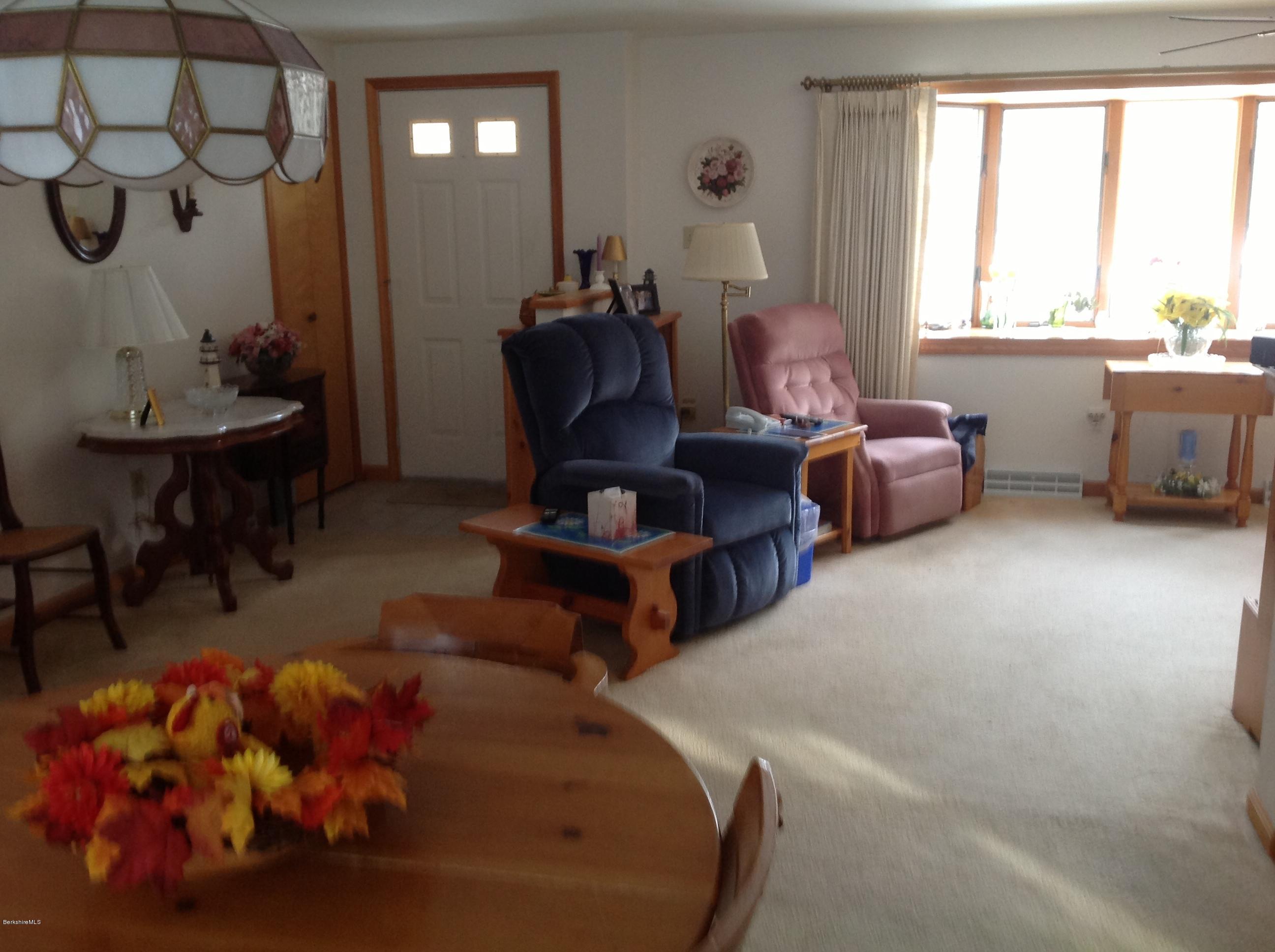243 Bunce Road South Sheffield, MA 01222 - Photo 4 of 18 a living room with furniture and a window
