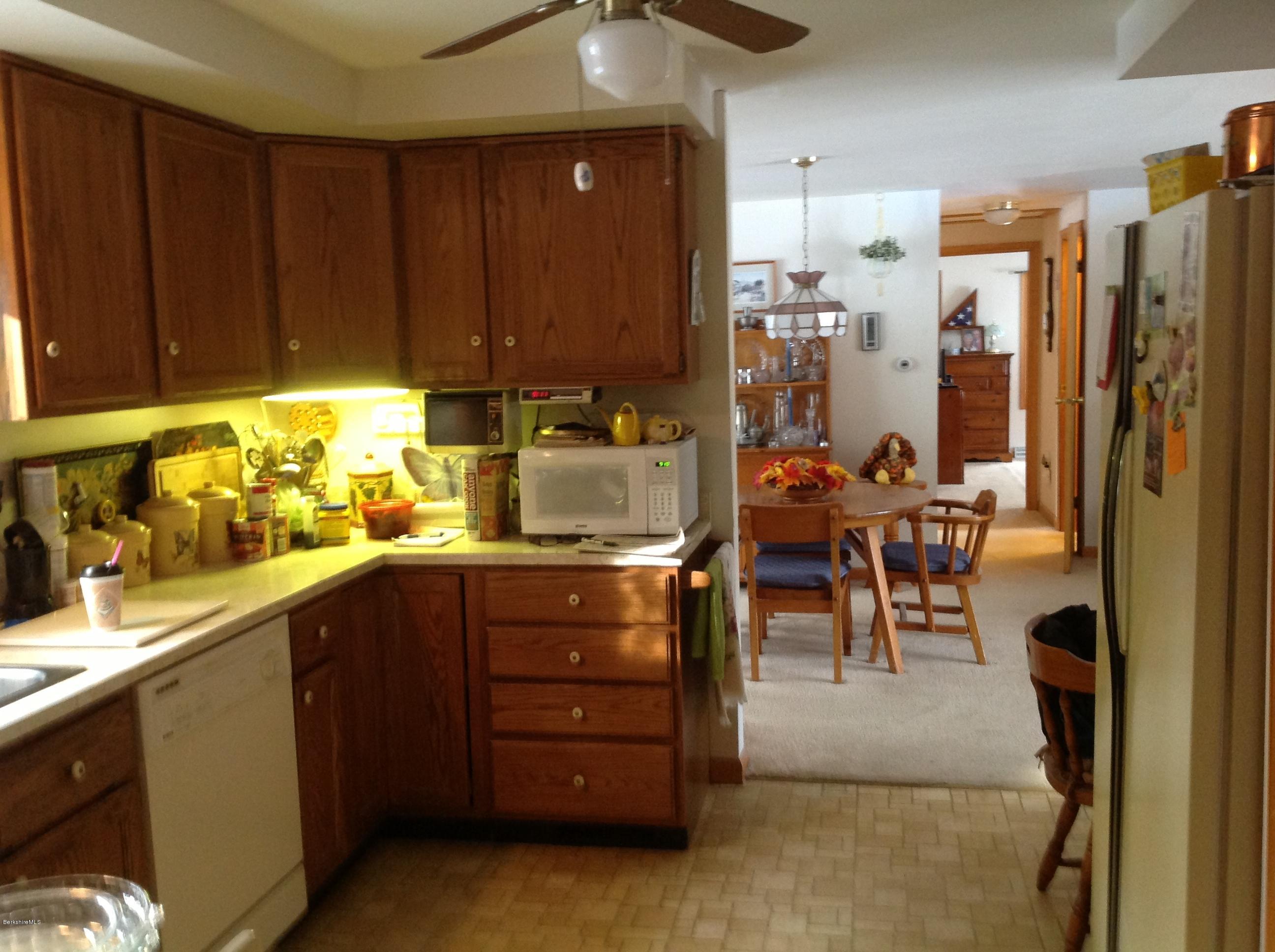 243 Bunce Road South Sheffield, MA 01222 - Photo 6 of 18 a kitchen with stainless steel appliances granite countertop a refrigerator and a stove