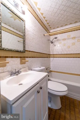 a bathroom with a sink and a toilet
