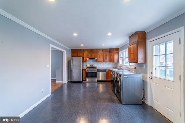 an empty room with a empty space and window