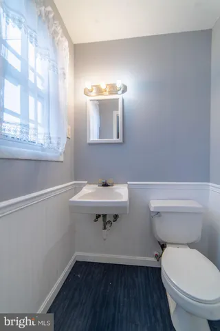 a bathroom with a sink and a toilet