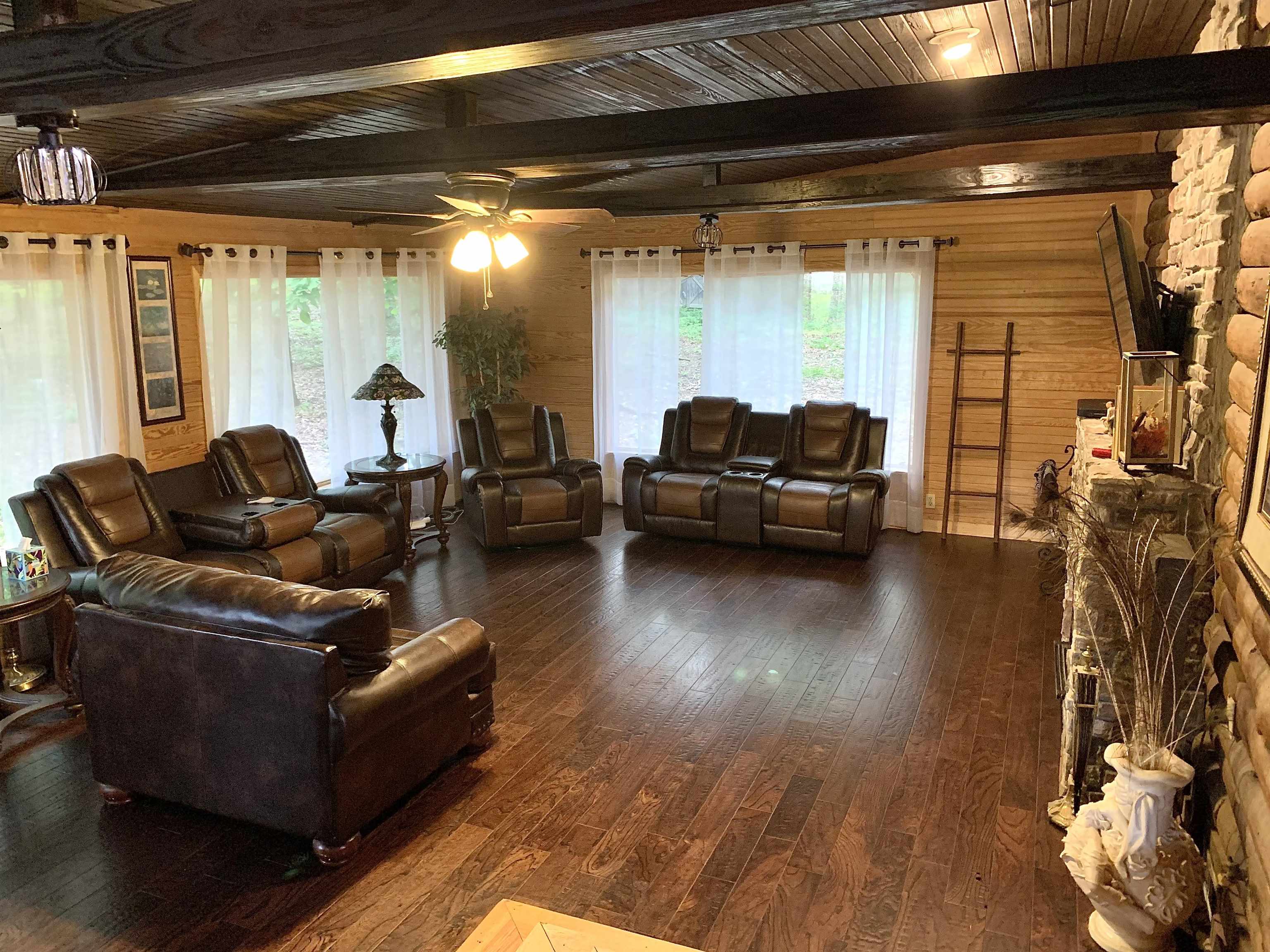 4560 Bishop Road Middleton, TN 38052 - Photo 18 of 40 Living room featuring beam ceiling, ceiling fan, and dark wood-style floors