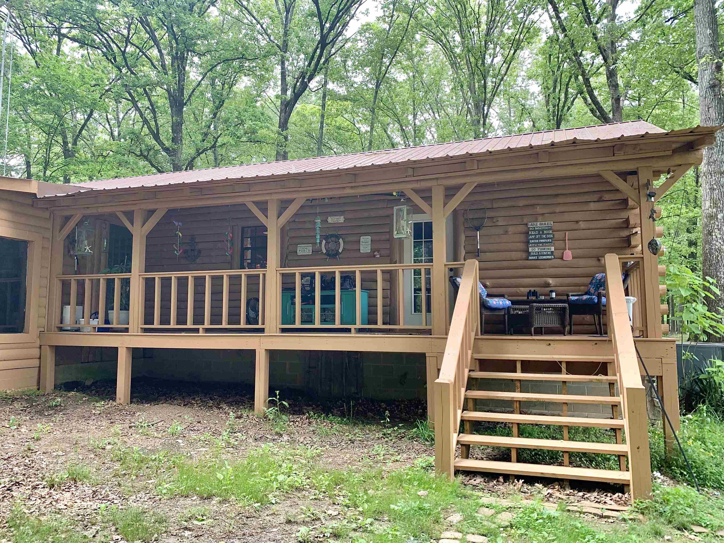 4560 Bishop Road Middleton, TN 38052 - Photo 6 of 40 Back of house with metal roof and stairway