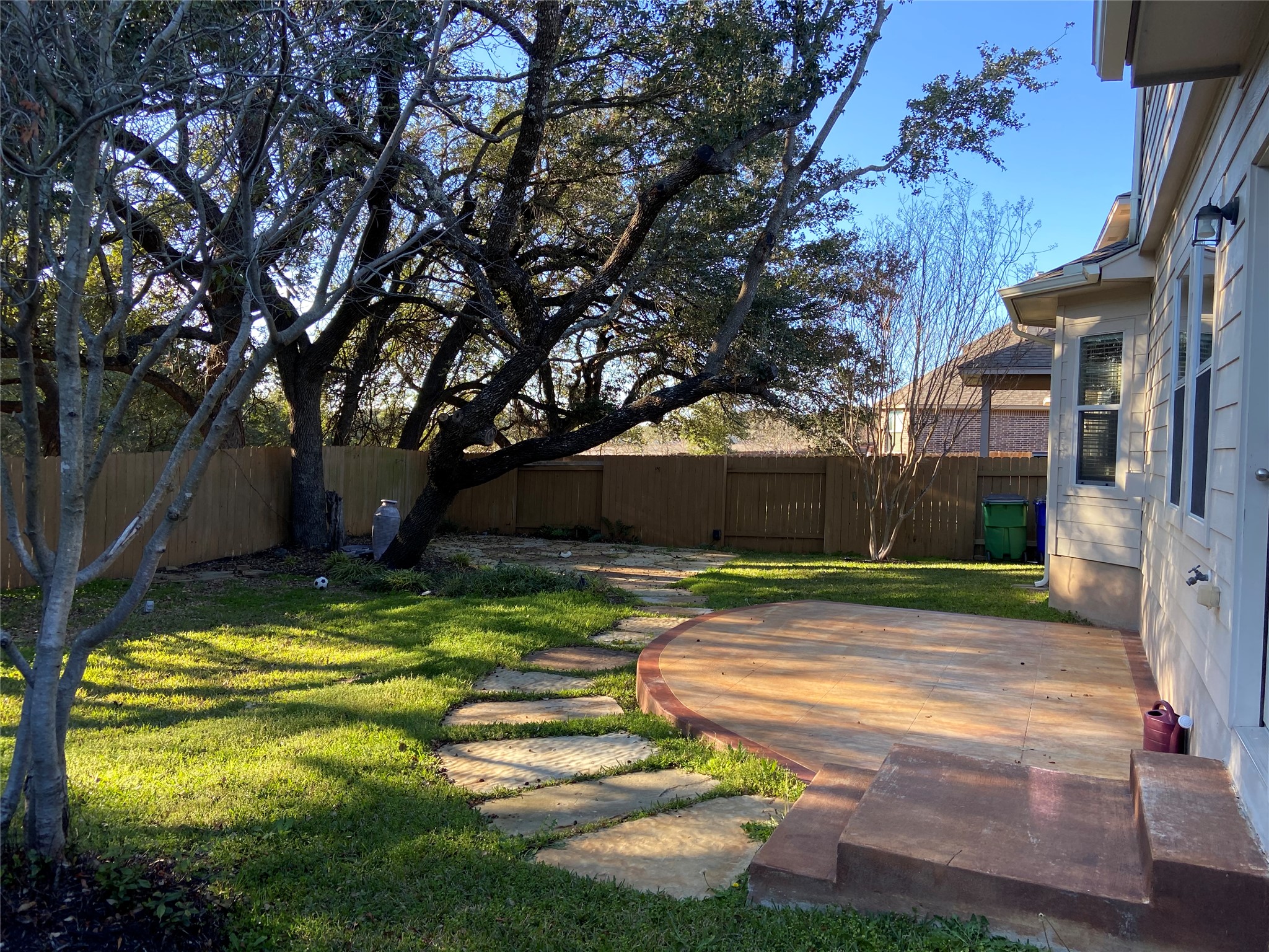 1501 Rimstone Drive Cedar Park, TX 78613 - Photo 19 of 20 Fenced backyard featuring a patio area and open land behind property (no rear neighbors).