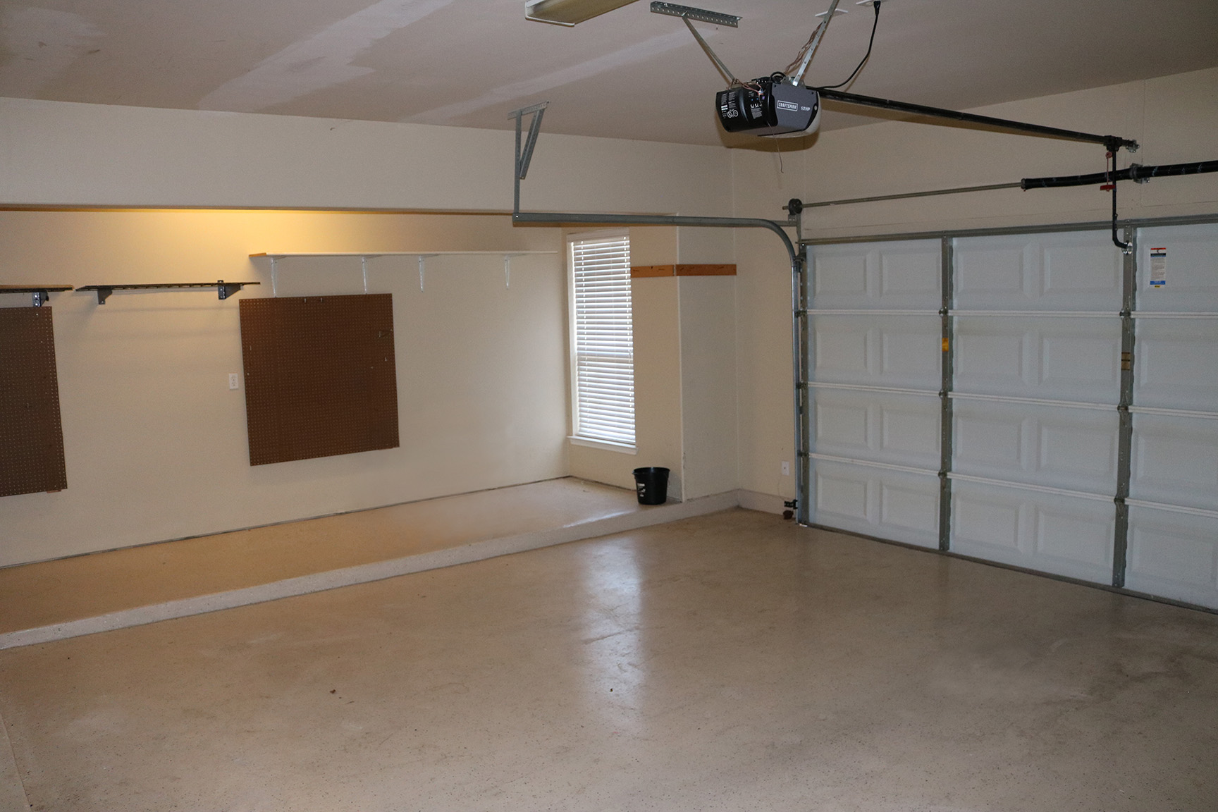 1501 Rimstone Drive Cedar Park, TX 78613 - Photo 20 of 20 Garage with extra storage area and a garage door opener