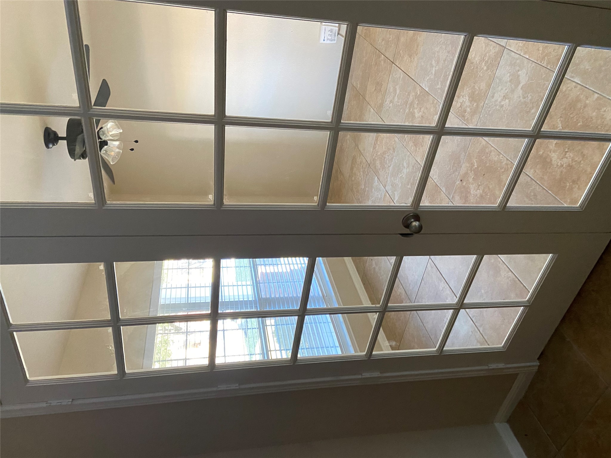 1501 Rimstone Drive Cedar Park, TX 78613 - Photo 7 of 20 Formal dining room or can be used as an office. Detailed view of French doors and a ceiling fan.