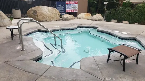 a view of a chairs and tables in patio