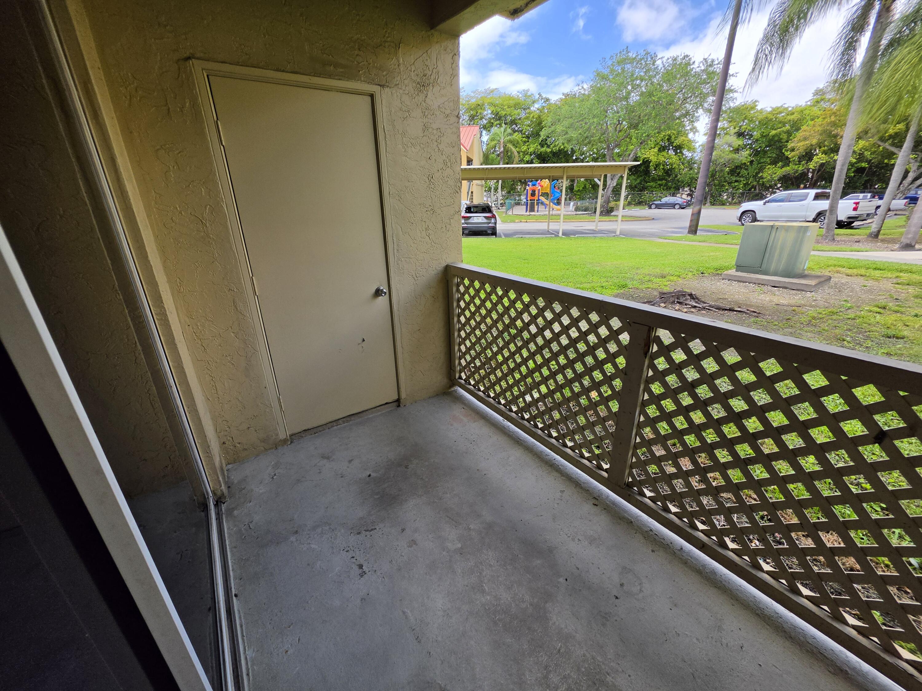 18340 Northwest 68th Avenue, Unit F Hialeah, FL 33015 - Photo 2 of 15 1
