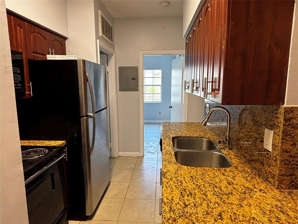 18340 Northwest 68th Avenue, Unit F Hialeah, FL 33015 - Photo 10 of 15 9