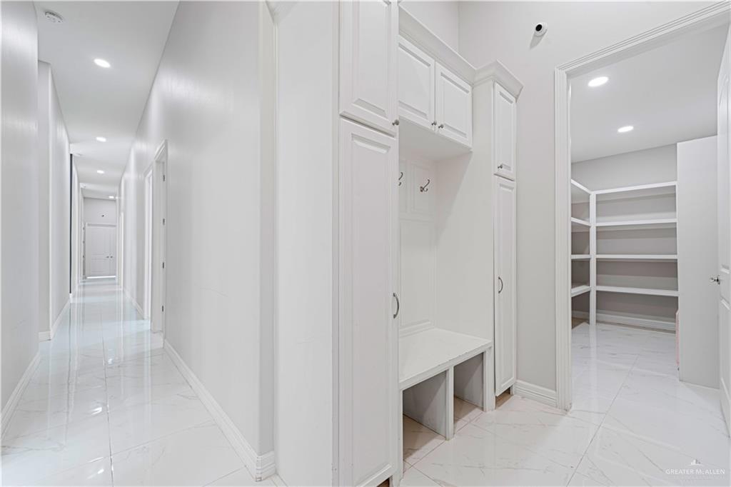 1208 Travis Street Mission, TX 78572 - Photo 12 of 41 a spacious bathroom with a shower and a tub