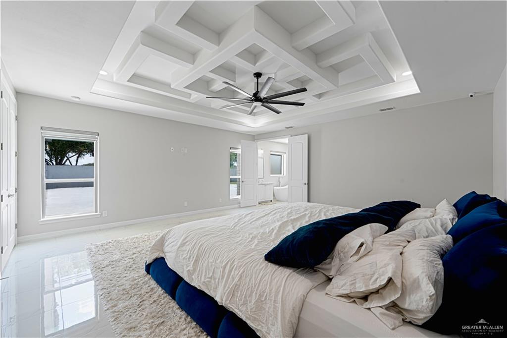 1208 Travis Street Mission, TX 78572 - Photo 20 of 41 a bedroom with a bed and window