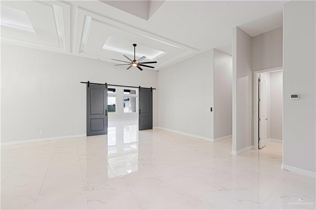 1208 Travis Street Mission, TX 78572 - Photo 2 of 41 a view of a livingroom with a chandelier
