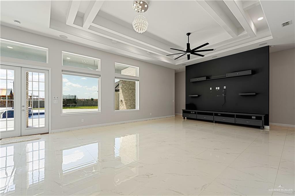 1208 Travis Street Mission, TX 78572 - Photo 31 of 41 a view of a livingroom with a ceiling fan and window