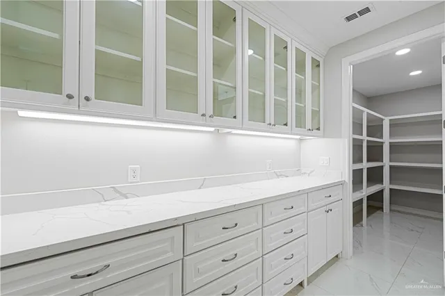 a view of cabinets and window