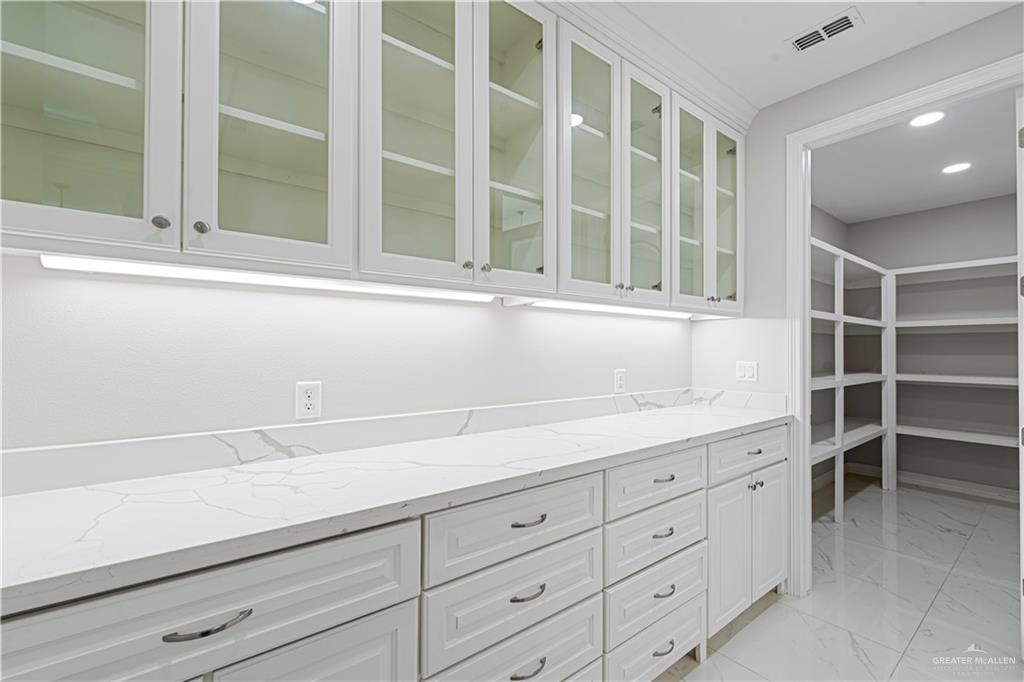 1208 Travis Street Mission, TX 78572 - Photo 34 of 41 a view of cabinets and window