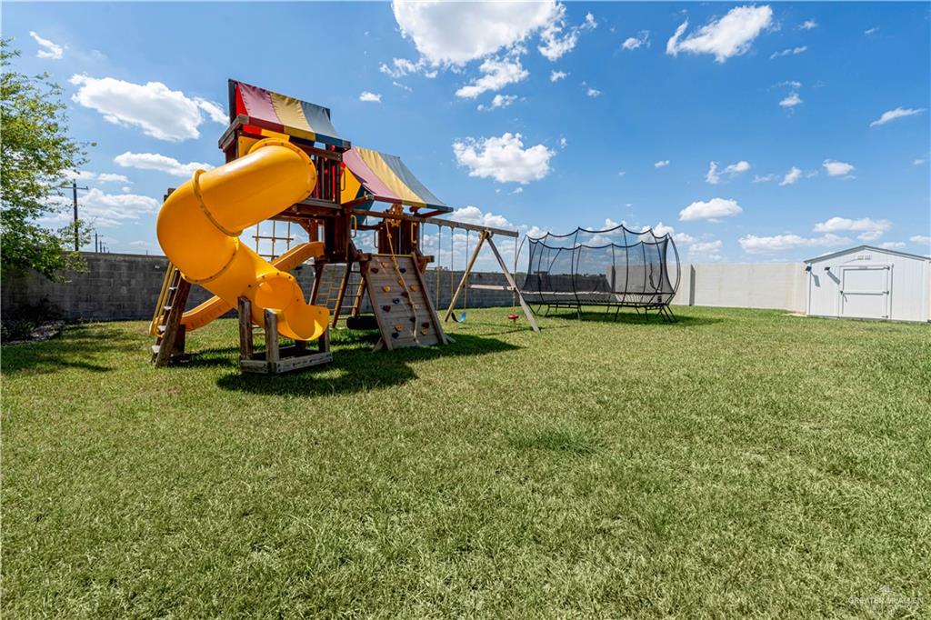 1208 Travis Street Mission, TX 78572 - Photo 39 of 41 a view of a house with a park