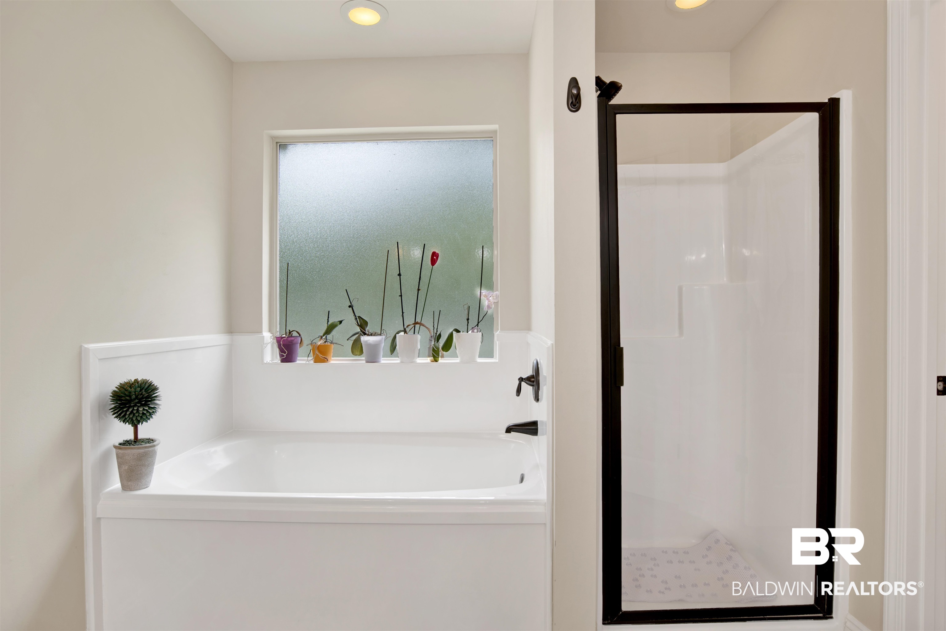 8542 Three Dean Way Mobile, AL 36695 - Photo 20 of 26 Bathroom with a bath, a stall shower, and recessed lighting