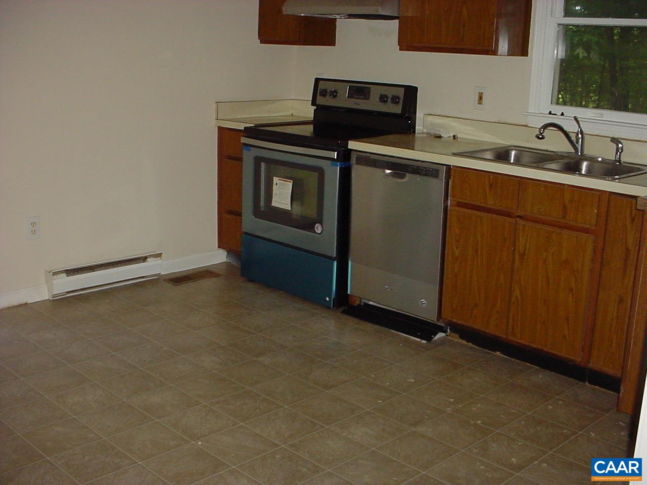 8006 Chestnut Grove Road Esmont, VA 22937 - Photo 4 of 9 a kitchen with a sink and cabinets