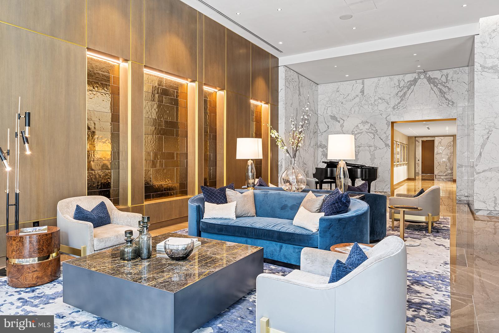 1911 Walnut Street, Unit 4302 Philadelphia, PA 19103 - Photo 7 of 20 a living room with furniture and a large window